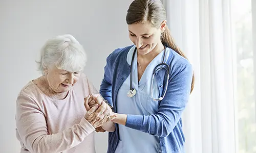 elderly woman with nurse